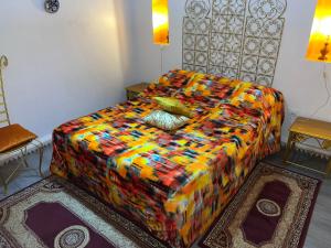 Letto o letti in una camera di Riad Le Lieu