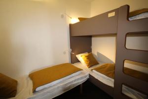 Un pat sau paturi într-o cameră la Résidence Varet 2 - Appartement 3 pièces 6-7 personnes Varet MAE-7864