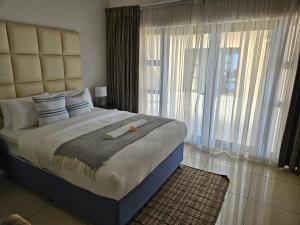 Ένα ή περισσότερα κρεβάτια σε δωμάτιο στο Mix Guesthouse