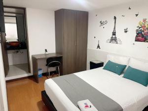 Postel nebo postele na pokoji v ubytování Hotel Boutique Radel + 6 fotografií