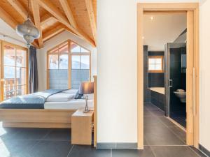Postel nebo postele na pokoji v ubytování Chalet Erlebnishaus II