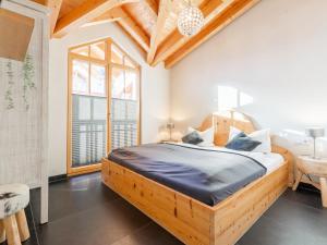 Postel nebo postele na pokoji v ubytování Chalet Erlebnishaus II
