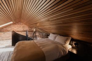 Ένα ή περισσότερα κρεβάτια σε δωμάτιο στο The Stable