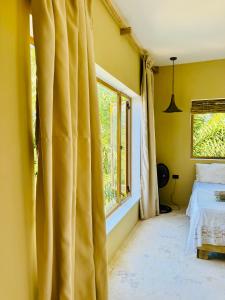 Postel nebo postele na pokoji v ubytování Suami s room Casa Padura