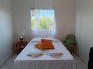 Postel nebo postele na pokoji v ubytování Villa Les Horizons, vue sur mer