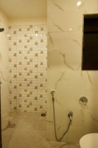 Koupelna v ubytování Hotel Pride Inn Shirdi