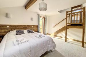 Postel nebo postele na pokoji v ubytování Résidence Le Bettex - Chalet CRISTAL MAE-0654