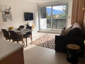 TV a/nebo společenská místnost v ubytování Résidence Bez - Studio · Cœur de station · Parking collectif & casier à skis MAE-9064