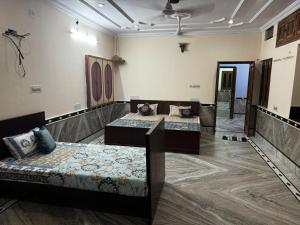 Rose Merry Guesthouse客房内的一张或多张床位