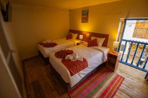 Postel nebo postele na pokoji v ubytování Hotel Encanto de San Blas