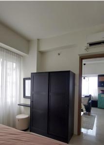 Koupelna v ubytování Apartemen Bogor Icon by Ade Properti