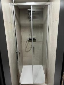 Koupelna v ubytování Vila Tanvald s wellness a wallboxem