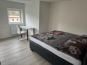 Postel nebo postele na pokoji v ubytování Vila Tanvald s wellness a wallboxem