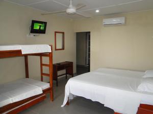 Postel nebo postele na pokoji v ubytování Hotel Nitana