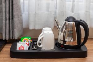 Kaffi- og teaðstaða á Airport Diana Hotel