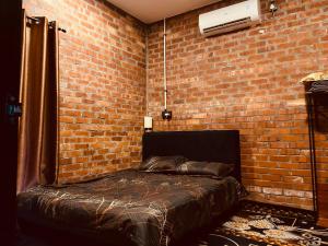 Postel nebo postele na pokoji v ubytování Homestay Damai D'Sawah