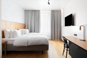 Postel nebo postele na pokoji v ubytování Solo Sokos Hotel Helsinki