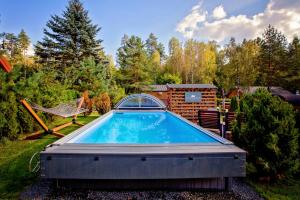 Basen w obiekcie Winiec Family Houses lub w pobliżu