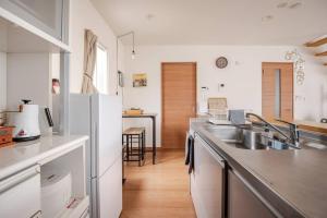 Köök või kööginurk majutusasutuses Garage villa KuuMa