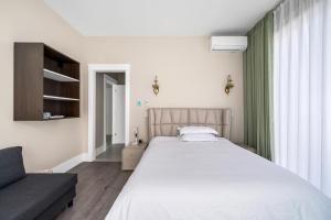 Postel nebo postele na pokoji v ubytování Amy Guesthouse