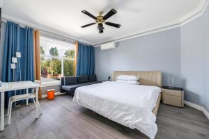 Postel nebo postele na pokoji v ubytování Amy Guesthouse