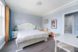 Postel nebo postele na pokoji v ubytování Amy Guesthouse