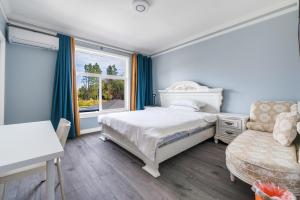 Postel nebo postele na pokoji v ubytování Amy Guesthouse