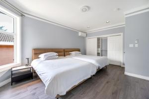Postel nebo postele na pokoji v ubytování Amy Guesthouse