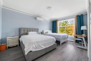 Postel nebo postele na pokoji v ubytování Amy Guesthouse