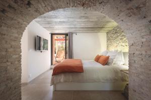 Postel nebo postele na pokoji v ubytování Bastide Sainte Trinide + 37 fotografií