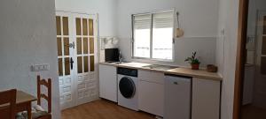 Η κουζίνα ή μικρή κουζίνα στο Casa Caracola +9 φωτογραφίες
