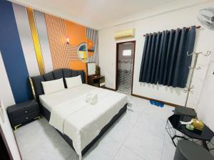 Postel nebo postele na pokoji v ubytování Nam Anh 3 Hotel