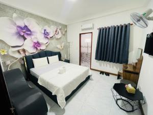 Postel nebo postele na pokoji v ubytování Nam Anh 3 Hotel