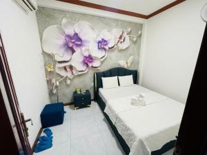Postel nebo postele na pokoji v ubytování Nam Anh 3 Hotel