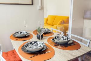 Posezení v ubytování Maison cosy avec terrasse à 15 minutes de Lyon et WIFI + 18 fotografií