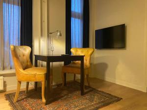 TV a/nebo společenská místnost v ubytování Logement Sylroede + 14 fotografií