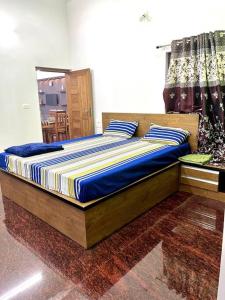 Voodi või voodid majutusasutuse Entire Private Luxury Resort in Wayanad - Cinnamon Villa Wayanad toas