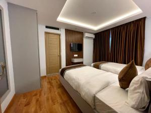 Letto o letti in una camera di Hotel Alleyway Express
