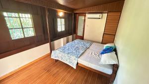 Ένα ή περισσότερα κρεβάτια σε δωμάτιο στο Arthunkal Beach villa Marari