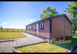 a tiny house in the middle of a yard at Five Waterings - Puddock Farm Romney Marsh in Brookland
