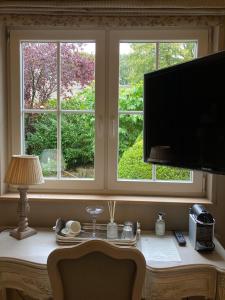 TV/Unterhaltungsangebot in der Unterkunft Villa Reynaert