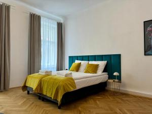 Postel nebo postele na pokoji v ubytování Milla Apartments
