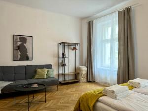 Postel nebo postele na pokoji v ubytování Milla Apartments