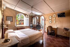 Μια τηλεόραση ή/και κέντρο ψυχαγωγίας στο Villa Amalia Resort for family & friends