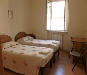 Postel nebo postele na pokoji v ubytování VILLA GLAUER - D'AMICO