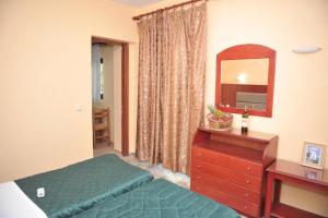 Posteľ alebo postele v izbe v ubytovaní Kerkyra Beach Hotel & Apartments