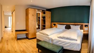 Postel nebo postele na pokoji v ubytování Hotel Brauerei Gasthof Höhn