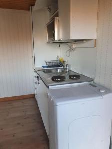 Dapur atau dapur kecil di Cottage with sea view South Koster +22 gambar