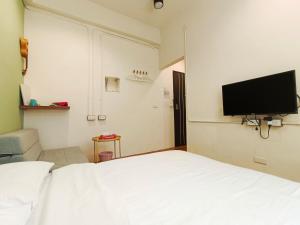 Televisyen dan/atau pusat hiburan di 東海小時光 Tong Hai Time Homestay