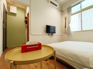 TV a/nebo společenská místnost v ubytování 東海小時光 Tong Hai Time Homestay